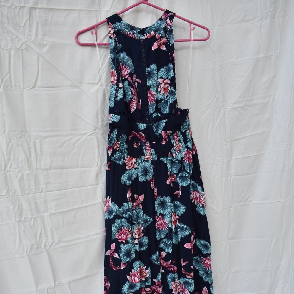 Dark blue floral floor-length halter top dress.